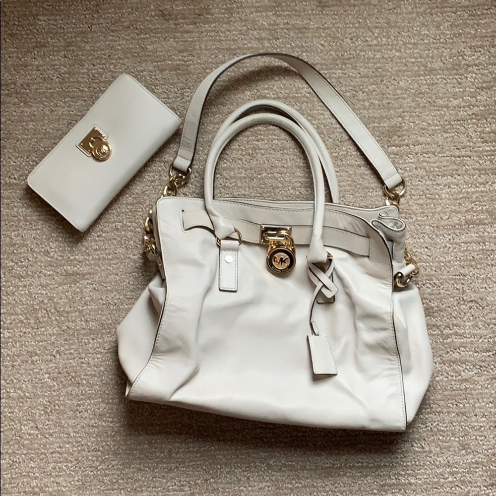 Michael Kors purse with matching wallet.